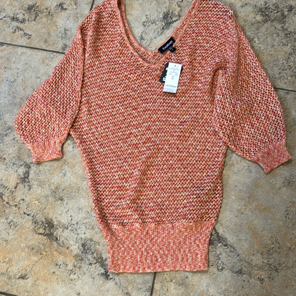 Bebe peach color beach type knit sweater